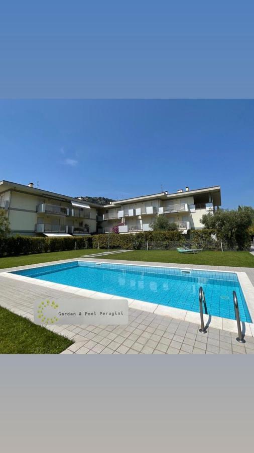 Garden & Pool Perugini Apartment Torbole Sul Garda Bagian luar foto